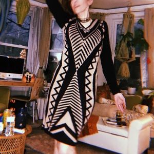 Knitted dress with Black&Tan geometric design.